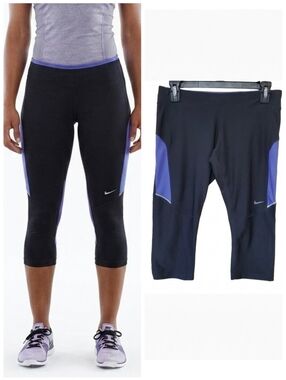 Nike dri-fit capri work out leggings Women'a size medium gray and purple